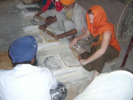 Helping to make chapatis
